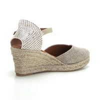 Cabrera 89-5 Alpargata de cuña rafia platino.