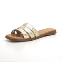 PORRONET 3119 SANDALIA PLANA DESTALONADA DE PIEL CON TACHUELAS ORO