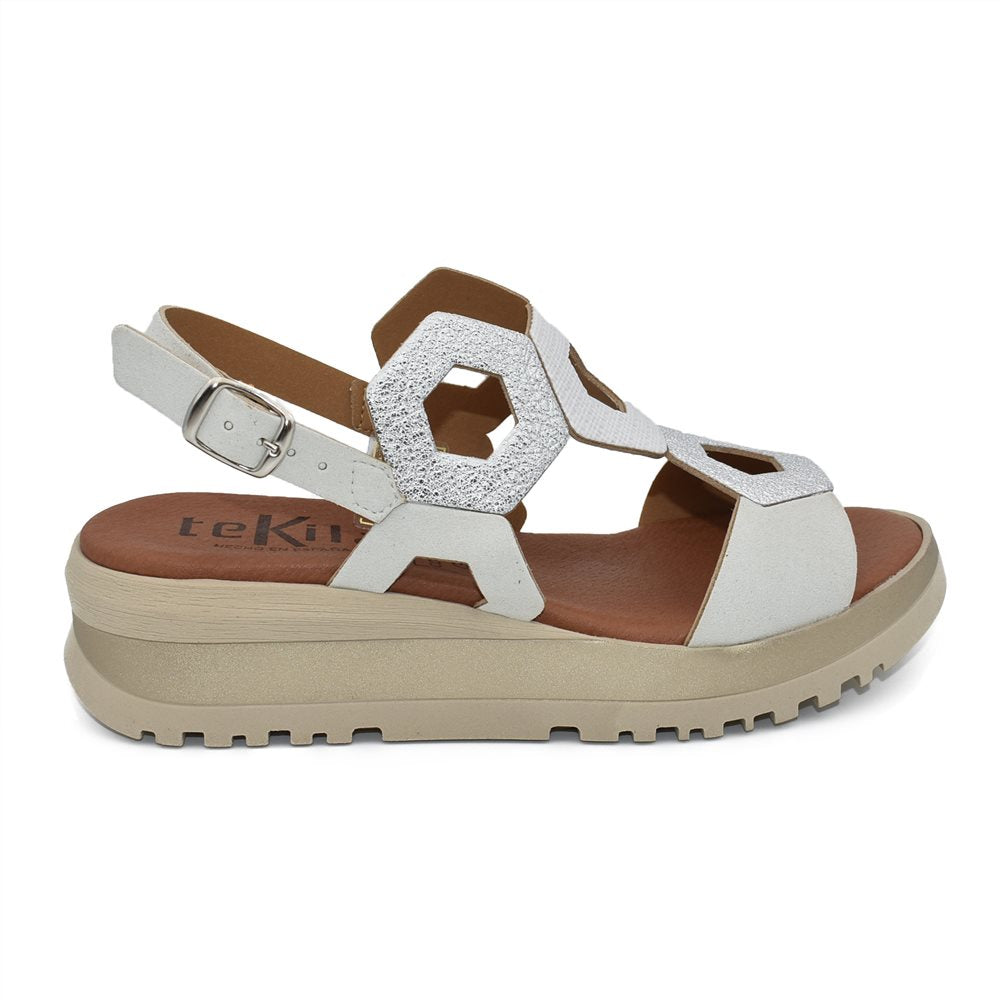 Tekila S1110 Sandalia cuña baja plataforma hexágonos hielo.